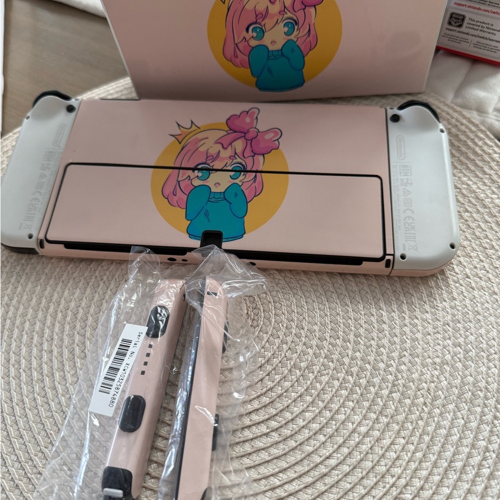 Custom Pink Gaming Console with Character Design
